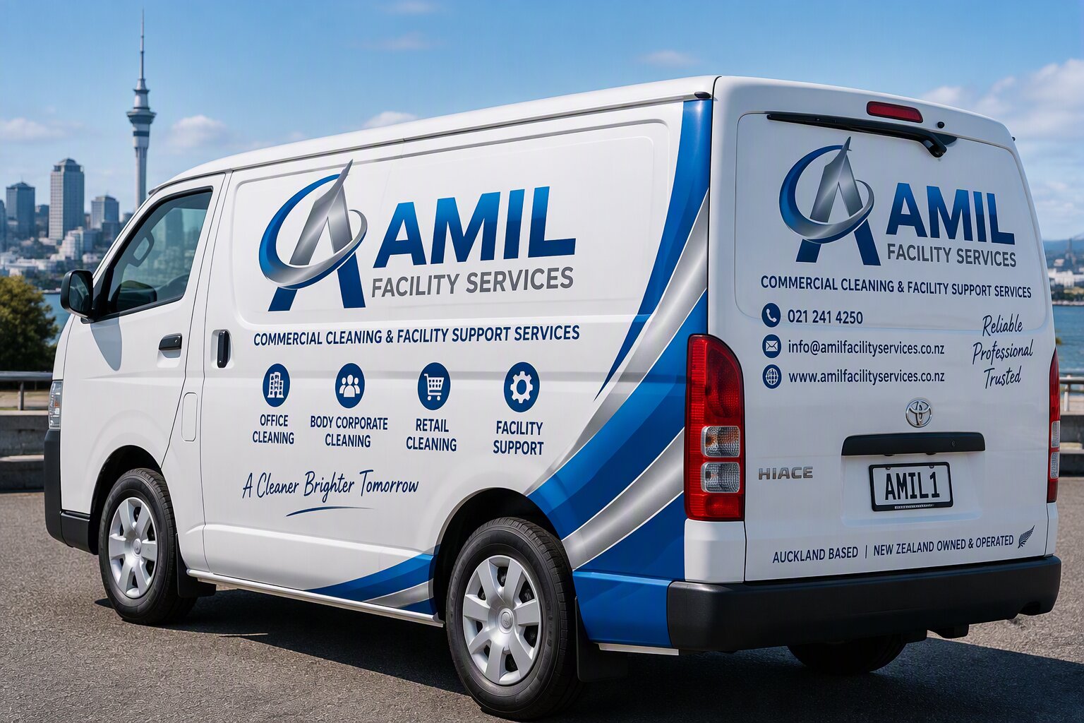 AMIL Facility Services branded van in Auckland with the Sky Tower behind